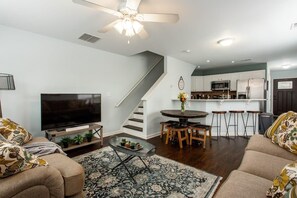 Enjoy cooking and socializing in this all in one Living Room/ Kitchen setting.