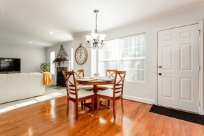 Wake up to a sunny day in the breakfast nook area of the kitchen.