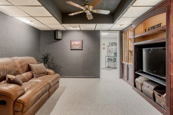 Welcome to the Theatre room.  Small but cozy.