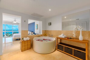 The master bedroom comes with a luxury indoor hot tub.