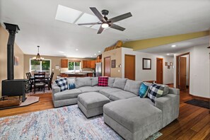 Expansive great room with fireplace—perfect for gathering the entire group! 