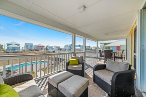 DECK: Back deck has evening lights and dining as well as seating areas