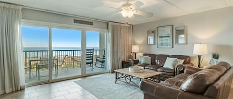 331 Amelia By The Sea- Beautiful Living Space with Magnificent Ocean and Pool Views, a Large Flat Screen Smart TV, and a Slider to the Terrace
