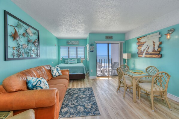 The ocean front living room is well-appointed with comfortable furnishings.