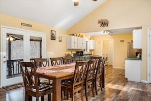 Dining Area to Kitchen and Screened Porch
