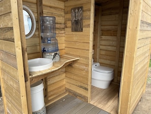 Water provided for the sink, counter space and a mirror.