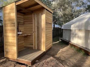 Private outhouse/loo with clean composting toilet.