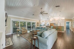 Main level living room- doors lead out to screened porch