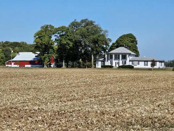 View from south. Guests stay in house of 2009. East addition was built in 2010.