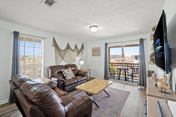 Living Area - Balcony Access - Smart TV