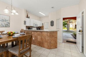 Kitchen and front entrance 