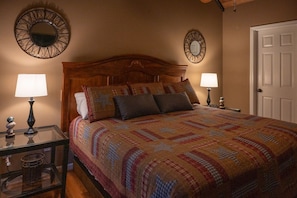 Main Bedroom - king bed and bathroom with garden tub