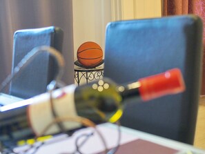 A glass of wine or a basketball match?