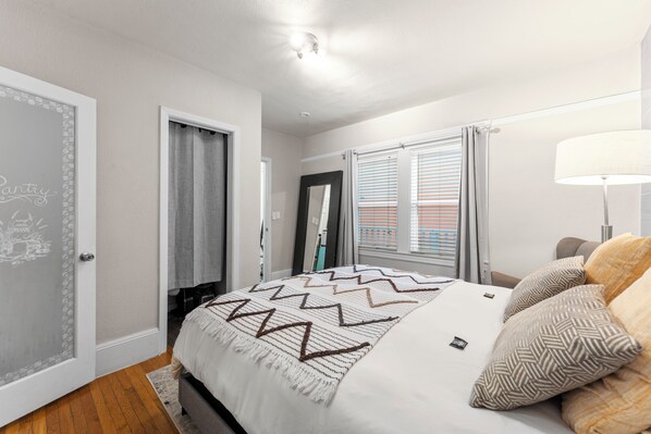 Experience pure relaxation in this perfect view of bedroom featuring cozy sheets