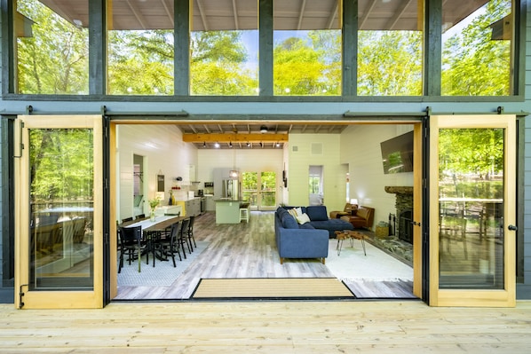 Deck facing 14 foot wall opening into cabin.