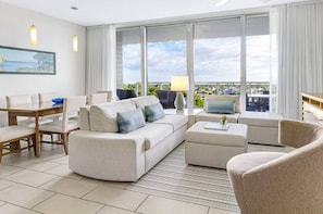 Spacious Living Area features a sleeper sofa for two.