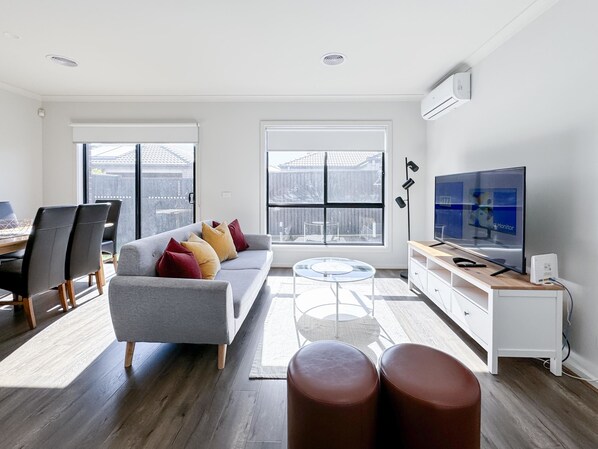 living room with large smart TV
