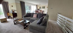 Living area looking to large dinning area