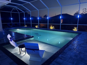 Lanai lights on the pool cage and pool LED lights for night swimming.