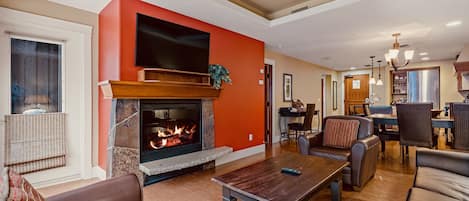 Relax in the spacious living room around the fireplace and enjoy the cable TV.