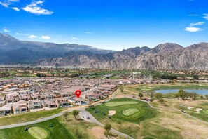 Between Hole 1 and the practice green on the world famous Stadium Course!