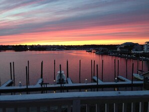 Sunset from primary bedroom balcony. 