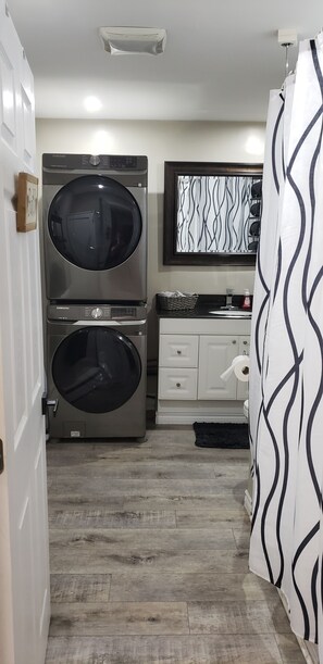 Laundry area and bathroom