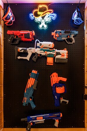 Find our hidden NERF battle station, chose your weapon of choice, goggle up, and have a blast!
