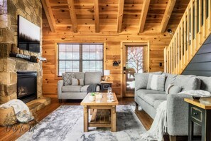 Cozy up on the couch and enjoy a movie by our toasty fireplace