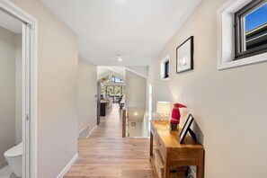 Beautiful entrance hall with stunning wooden floors 