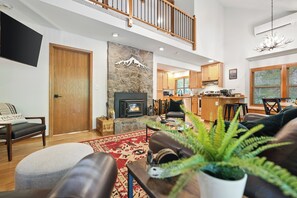 Cozy up in the open living space with room for everyone to relax.