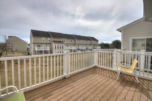 Enjoy some quiet time on the back deck with a drink.