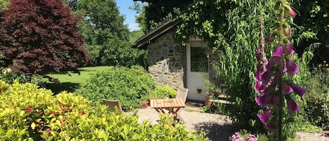 Hockmoor Garden cottage sits snug under the eaves of our Art and Crafts home