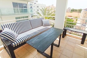 The main balcony with extralarge and comfortable sunbed sofa. Can be easily separated into 2 small sofas