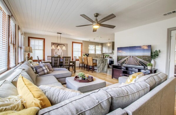 Open concept floor plan opens up to dining, living and kitchen areas. 