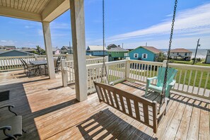 In the Swing of Things - Sitting on the porch swing with your morning coffee or a late-night glass of wine is a magical way to start or end your day.