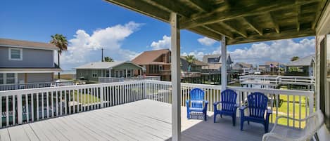 Easy Living - Take a moment for yourself to sit in one of the relaxing porch chairs and breathe in deeply of the fresh salty sea air, cool beverage in hand.