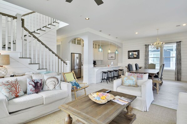 Pure Beauty - Rich decor paired with a harmonious color palette makes the living area the perfect space to plan out your day while enjoying much-needed family bonding time.