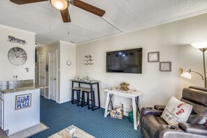 Gather in the Living Room For a Movie Night! - Pop a few bowls of popcorn, put a movie in, and settle in for a fun family night. The TV keeps the group entertained any time of year!