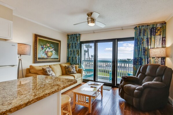 The living room’s view is spectacular - The airy living room opens onto the balcony, which in turn overlooks the soft white sands and the serene beach. You'll love the area with its bountiful wildlife, estuaries, and biking.