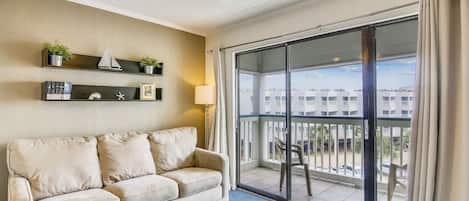 Easy Access - The living room provides quick and easy access to the patio where you can sit and enjoy your surroundings.