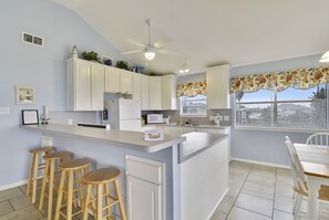 Coffee Anyone? - Pull up a stool to the breakfast bar and drink a morning cup of joe. It’s a great place to plan your day’s activities, gather your wits, and get ready for more quality time!
