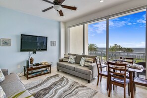 Easy Access - The living room provides quick and easy access to the patio where you can sit and enjoy your surroundings.