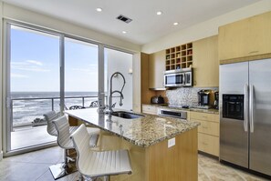 Full Size Kitchen with Breakfast Bar with Water Views