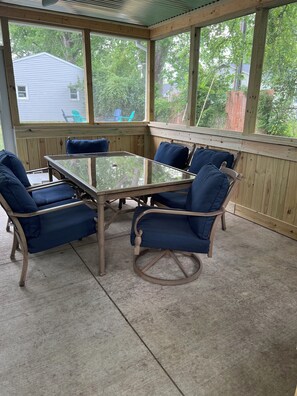 Interior of the screened in porch.