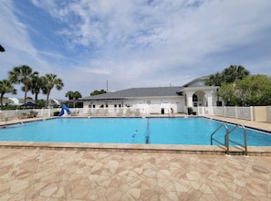 Huge community pool just a one minute walk from the condo