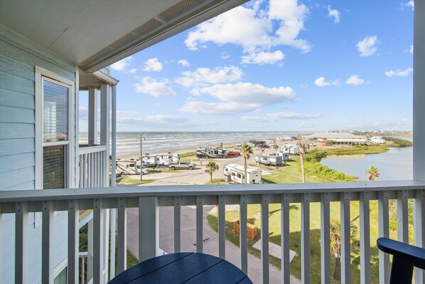 Pure Relaxation - The balcony makes the perfect place to enjoy a delicious meal or glass of wine while watching the sunset.