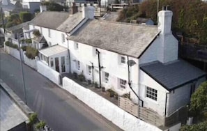 17th century cottage. Aerial view The Cottage. 3rd in line to sea.. 