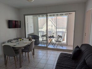 Bright living room with double sofa bed