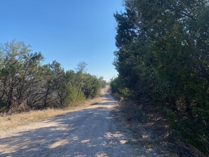 Long private gravel road entrance